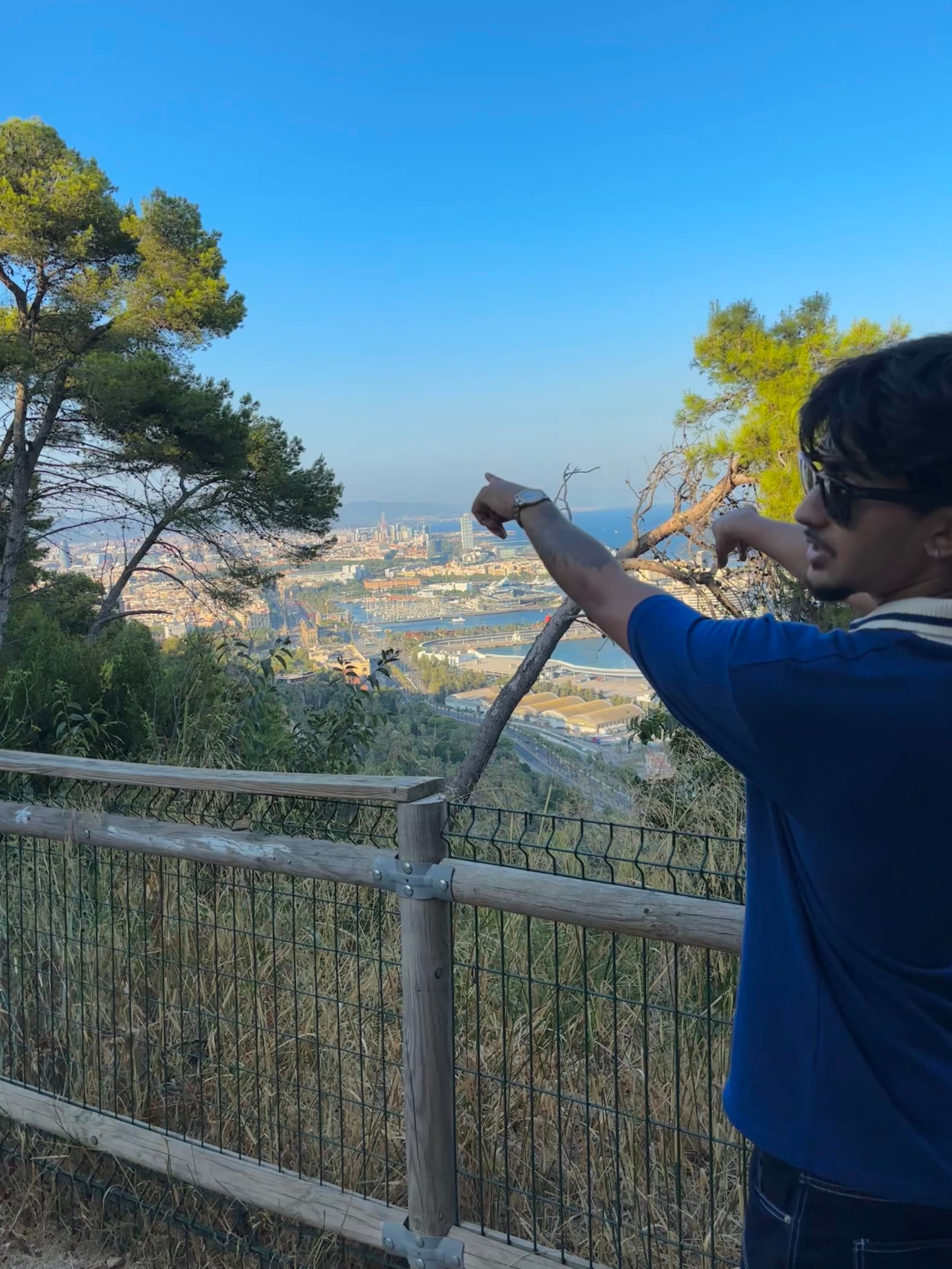 Neiloy overlooking a city view